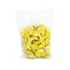 Gyoza alla piastra con pollo e verdure